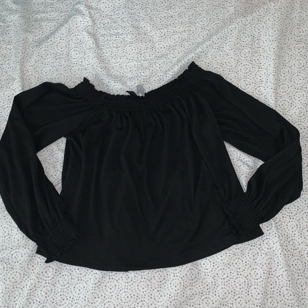 This is a black, off-shoulder top